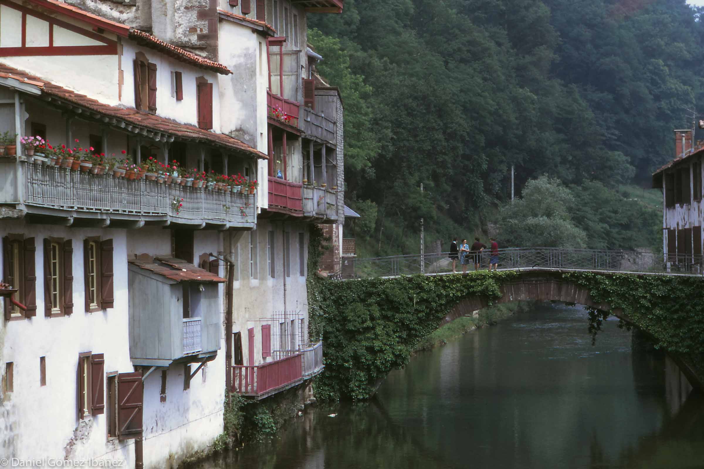 Two streams descend from the Pyrenees and join to form the R. Nive at the French Basque town of St. Jean Pied-de-Port, so called because of its position at the beginning of the routes that climb to the pass of Ibañeta at Roncesvalles. This is the Nive de Behérobie. [St. Jean Pied-de-Port, Pyrénées-Atlantiques, France, 1973]