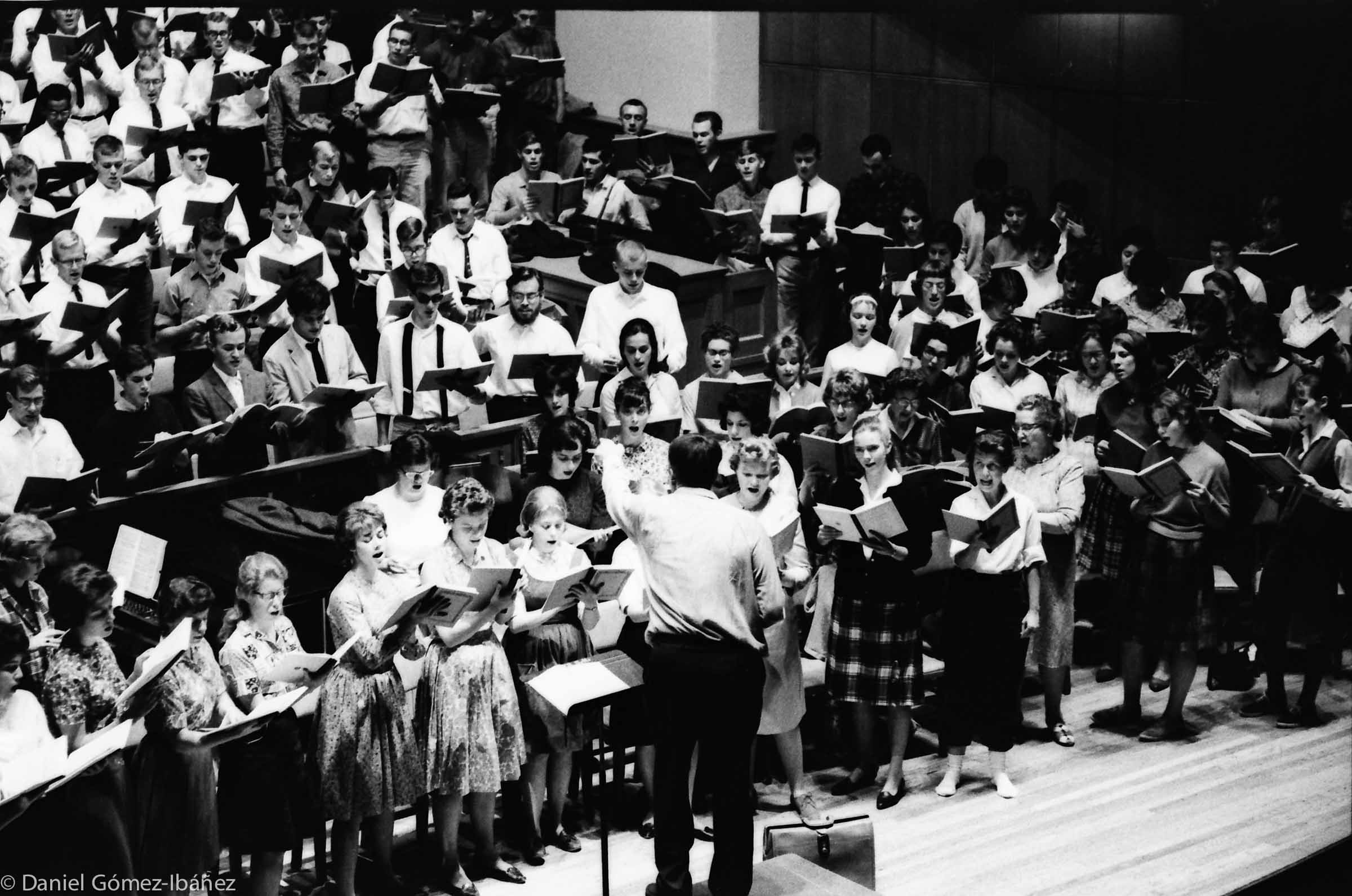 Musical Union, a choral group conducted by Robert Fountain that included singers from both the town and the college, meets weekly in Oberlin's Finney Chapel to rehearse Handel's "Messiah" (Oberlin College, fall 1963)
