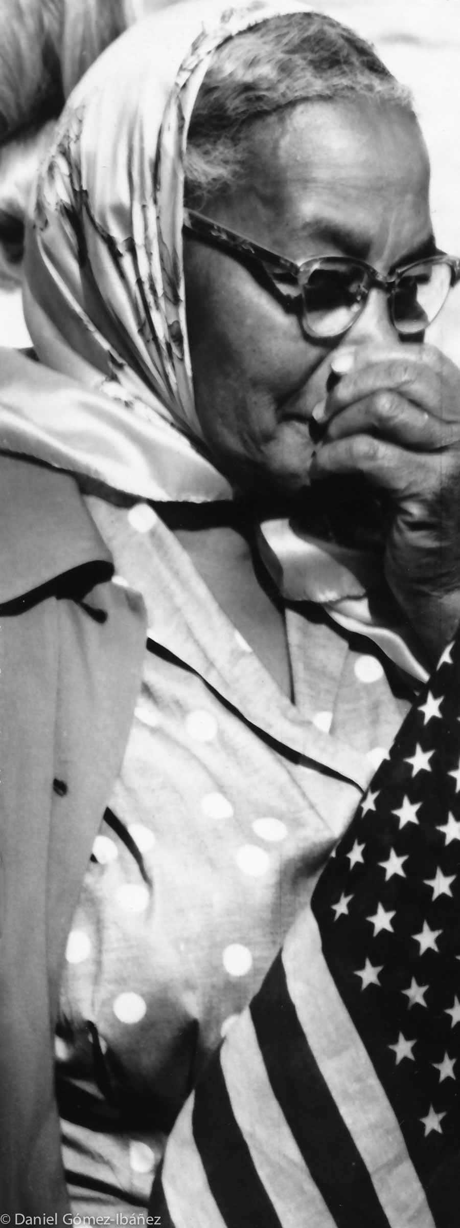 An unidentified woman also carried a flag. When asked why, she observed, "I've lived under it for 63 years and I thought it belonged here. It shows I have every right in the Constitution."