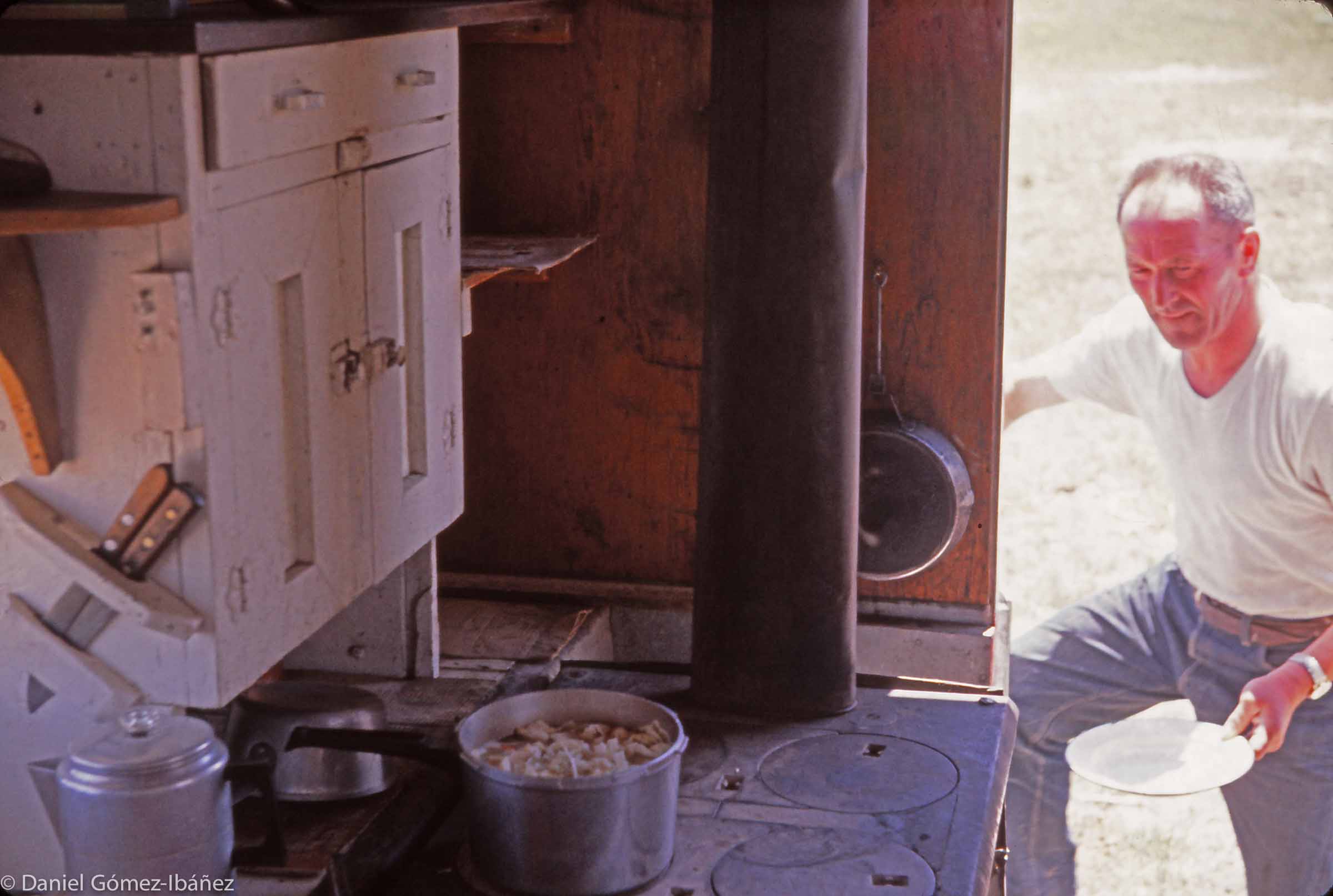 A cookstove in the well-equipped camp wagon provides meals and warmth. Like most herders, Martin Escurdia even made his own bread, large loaves that he baked in a Dutch oven.