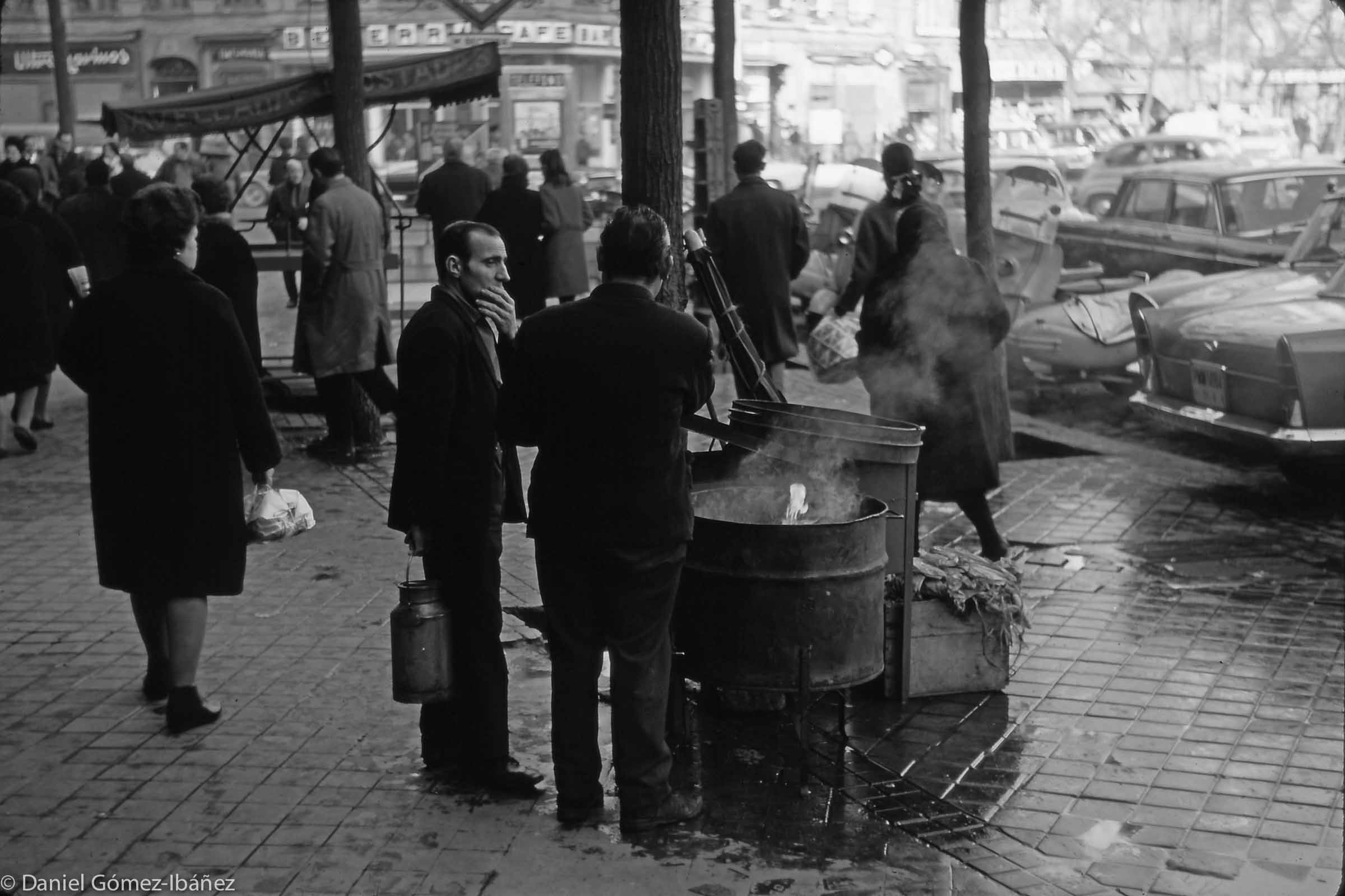 With the vendor of roasted chestnuts [Madrid, Spain, 1968]