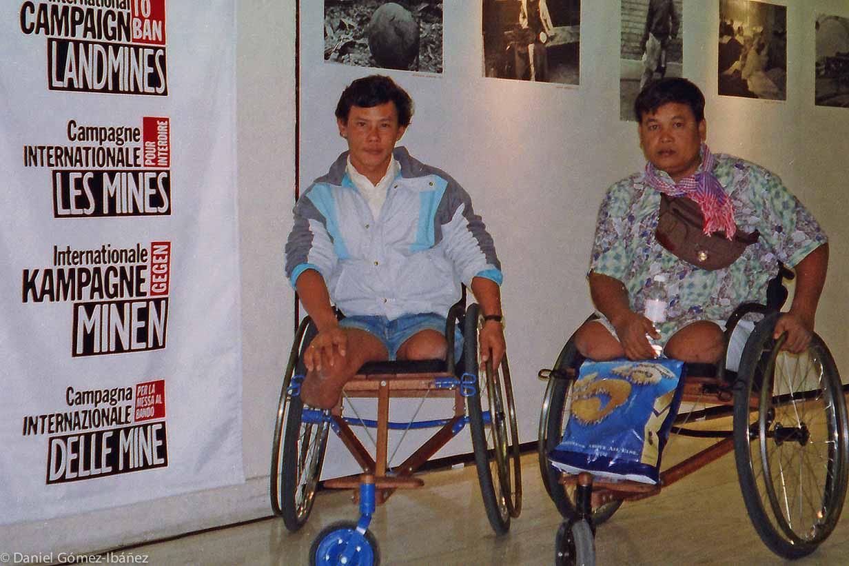 Tun Channareth (at left with his friend Truk) a landmine survivor from Cambodia, at the United Nations in Geneva in 1996. They were there to help efforts by the International Campaign to Ban Landmines to add a landmines ban to the UN Convention on Certain Conventional Weapons. This did not happen, but campaigners at the meeting revised their tactics, and less than two years later 122 countries (161 now) signed a landmine ban treaty at Ottawa.© 1996